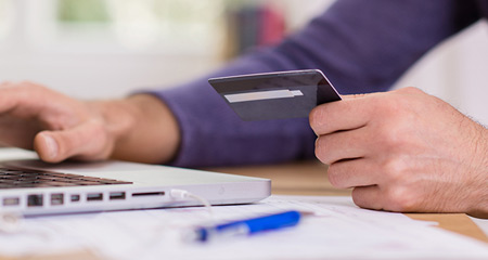 Man paying with a credit card.